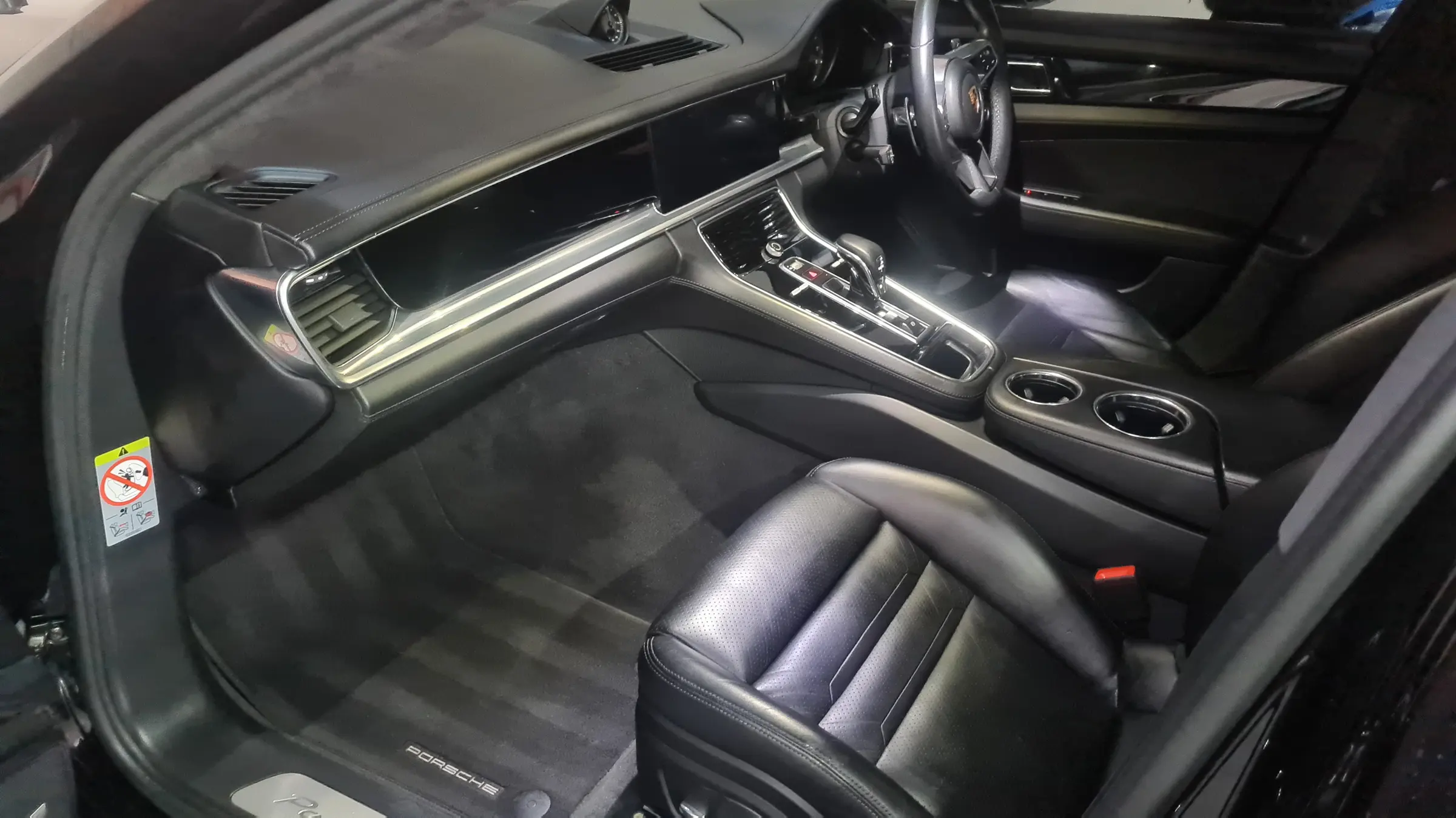 The front cabin of a Porsche Panamera after a full interior detail